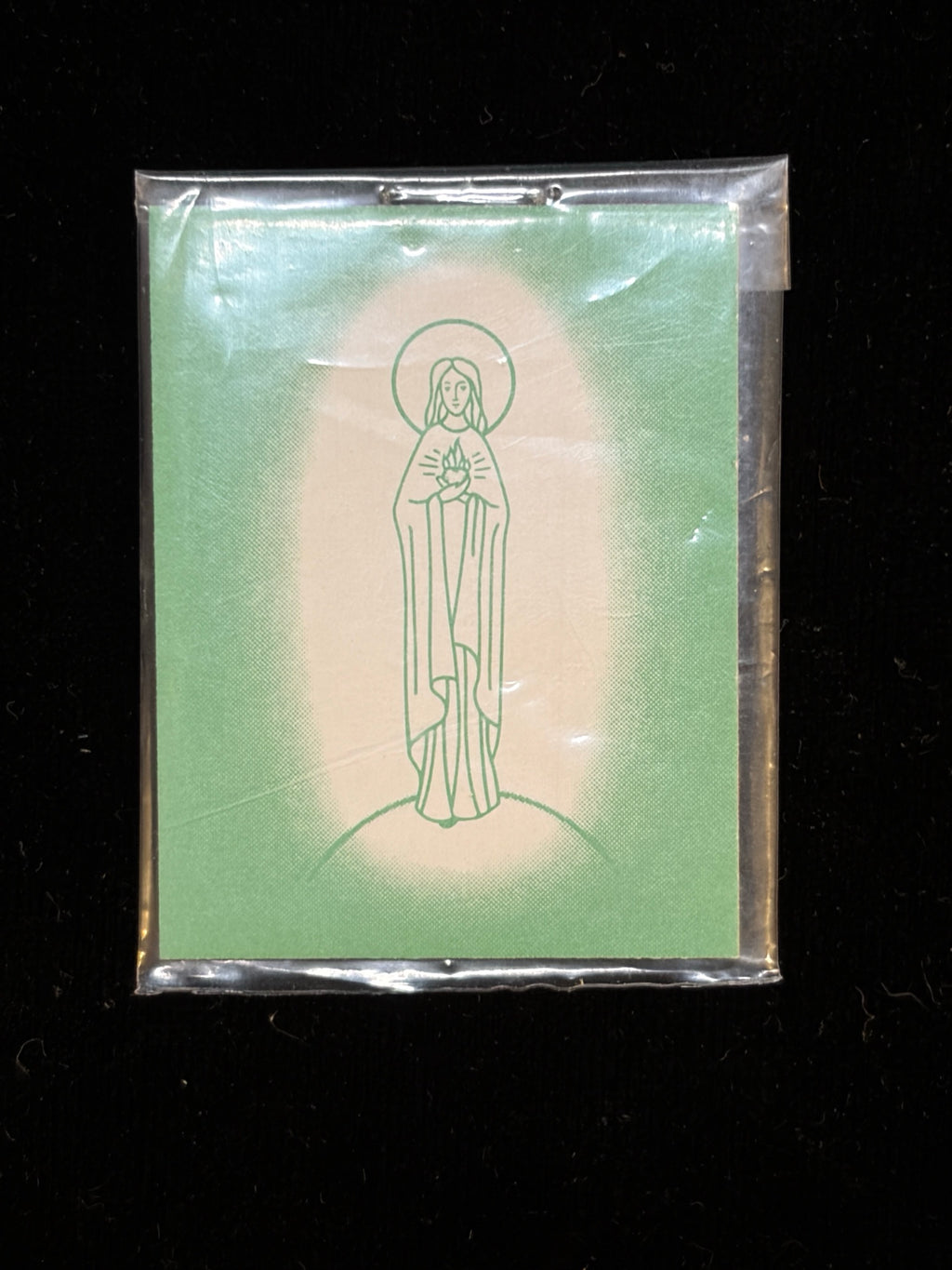Vintage Green Scapular showing the Virgin Mary with her Immaculate Heart, sealed in original plastic sleeve