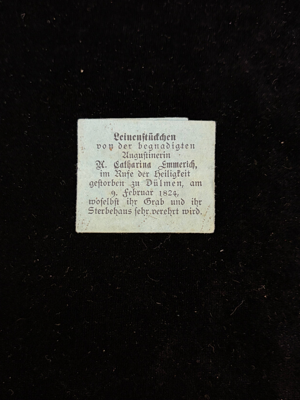 Antique blue paper relic packet of Blessed Anne Catherine Emmerich printed in German Fraktur, Leinenstueckchen, Duelmen 1824
