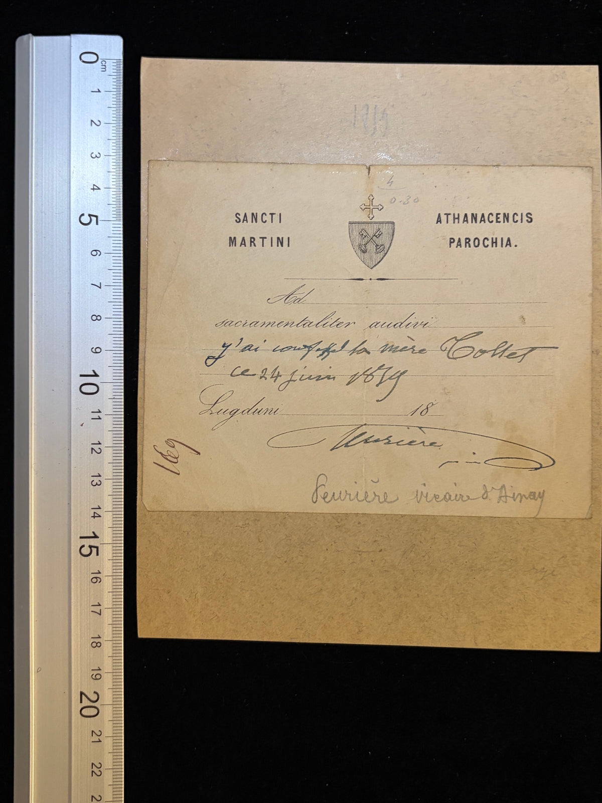 1879 confession certificate next to a ruler showing its size, certificate about 13.5 x 11 cm on a 14.5 x 18.5 cm mount