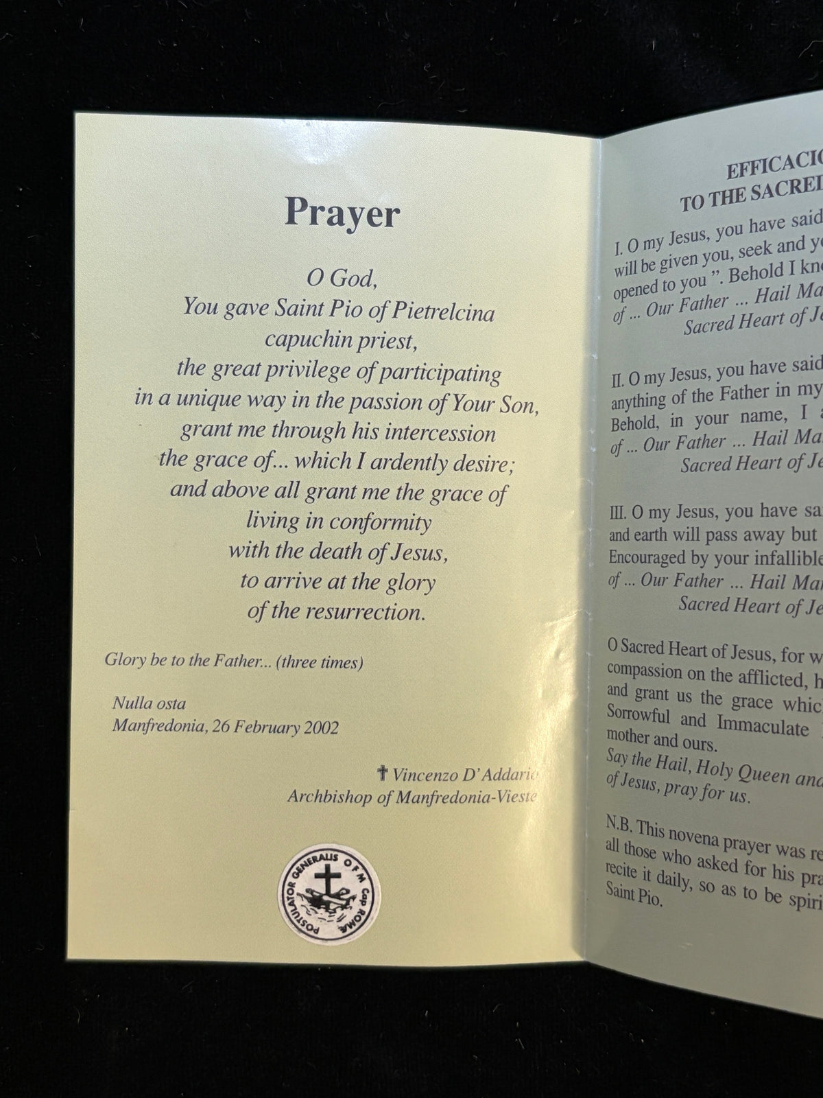 Close-up of prayer to Saint Pio of Pietrelcina with Nulla osta of Archbishop of Manfredonia 2002 and seal of the Capuchin Postulator General