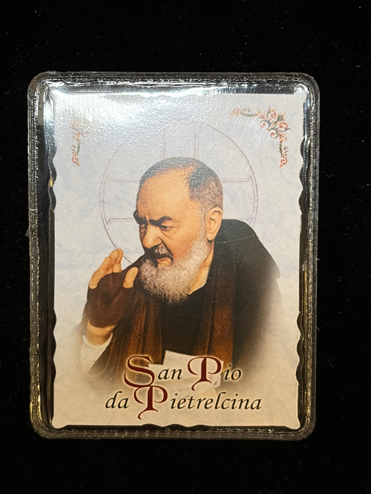 Reverse of Padre Pio relic card showing Saint Pio of Pietrelcina in Capuchin habit giving a blessing
