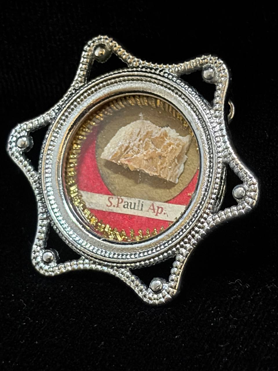 Saint Paul the Apostle relic in a silver star-shaped theca, label S. Pauli Ap., front view
