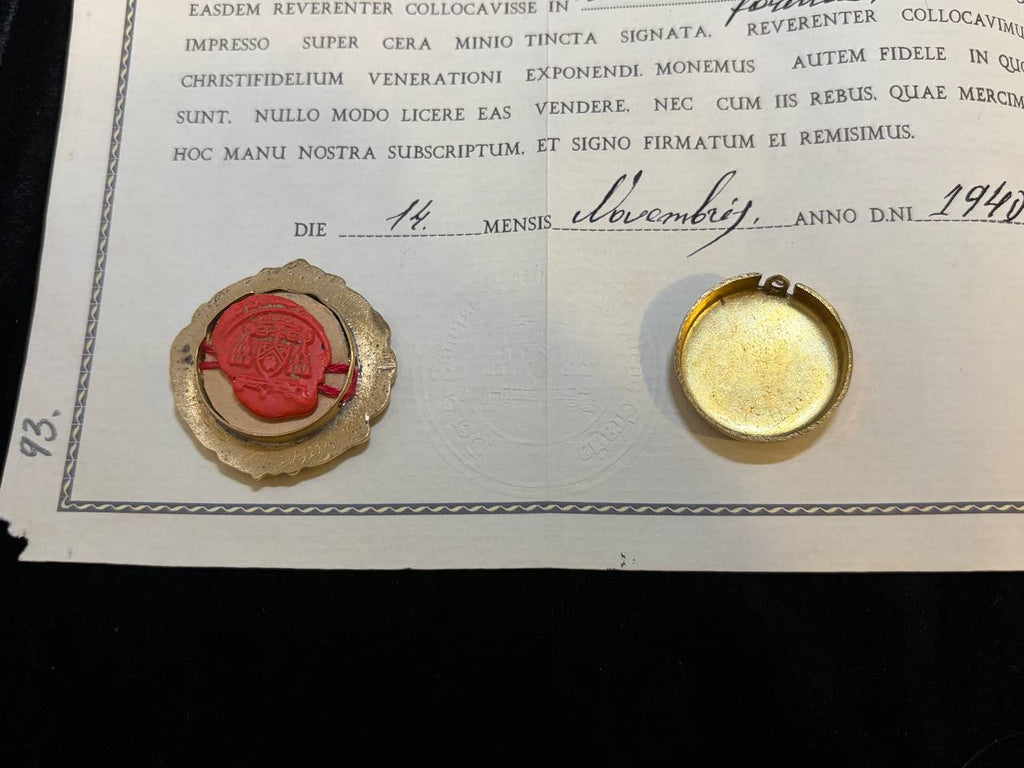 Red wax seal on the back of the Saint Lazarus theca beside the dated certificate