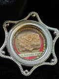 Saint Anthony of Padua relic in a silver star-shaped theca, label S. Antonii Pat., front view