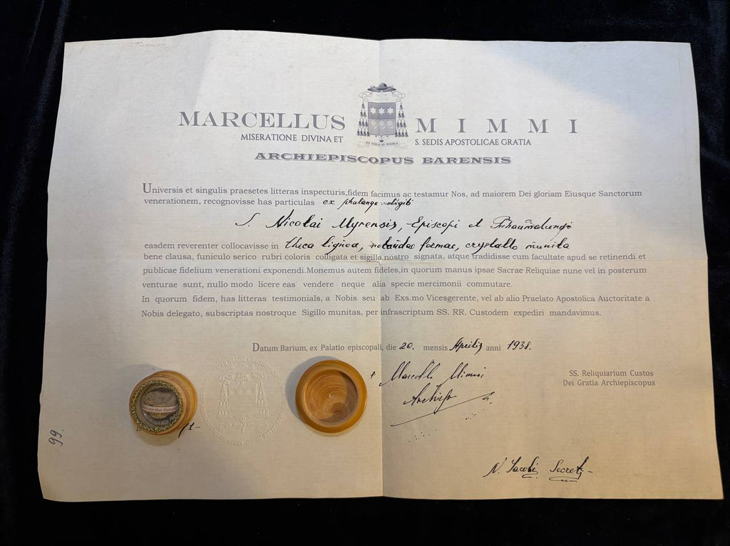 1938 certificate of Archbishop Marcellus Mimmi of Bari for the Saint Nicholas finger-bone relic, shown with the wax seal and theca
