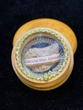 Saint Nicholas of Myra relic ex phalange digiti in a round wooden theca with gilt trim, label S. Nicolai Myr. Episcopi