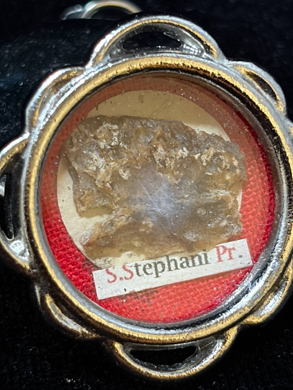 Detail of the Saint Stephen the Protomartyr relic inside the silver-tone theca