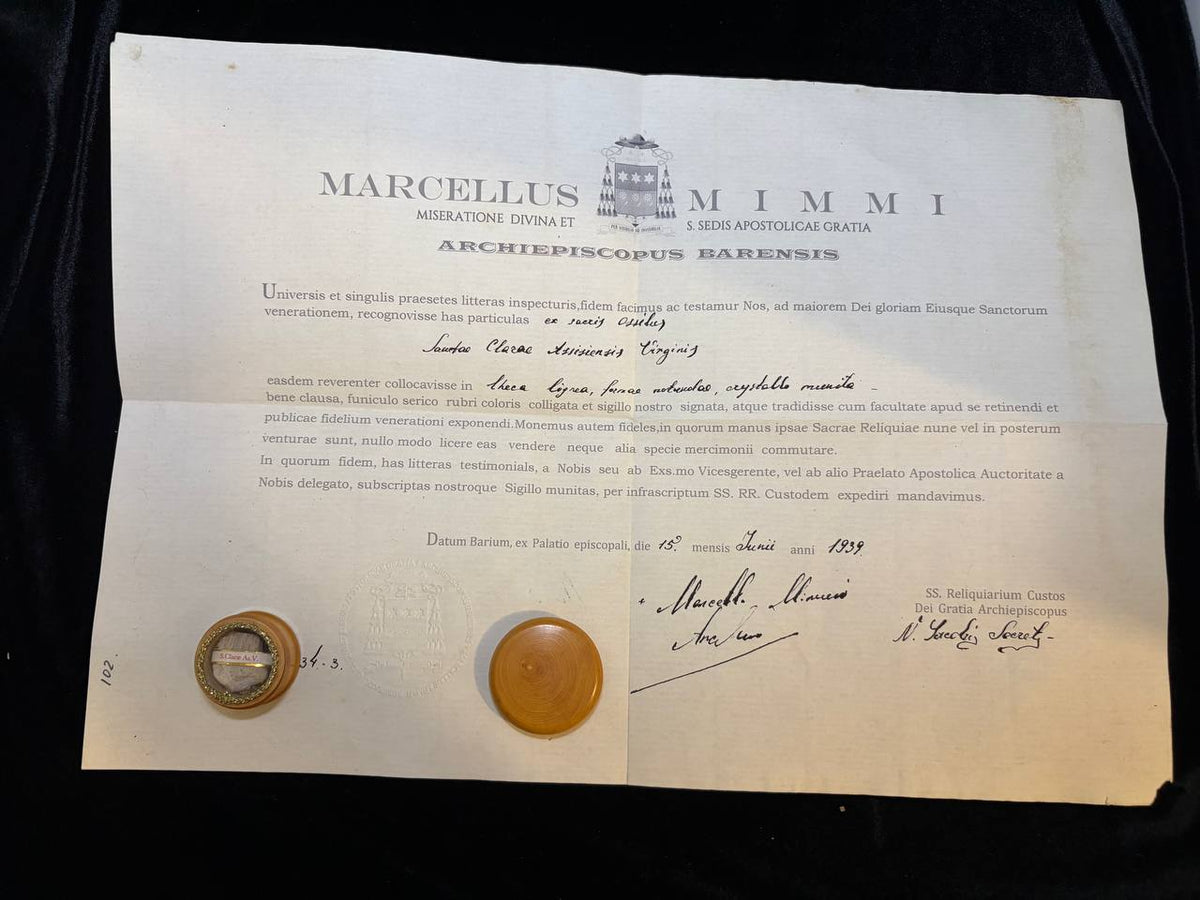 1939 ecclesiastical certificate of Archbishop Marcellus Mimmi of Bari for the Saint Clare relic, shown with the wax seal and theca