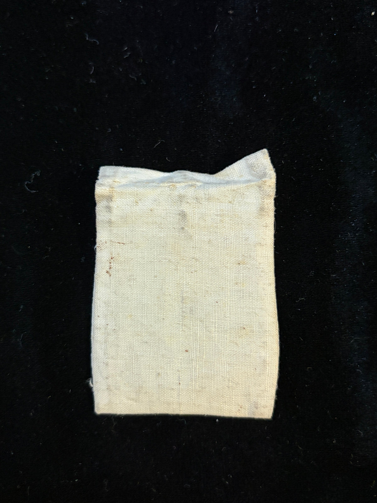 Back of the antique linen relic bursa of Saint Clement Martyr