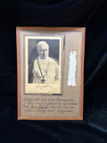 Contact relic of Saint Pope Pius X, cloth placed upon his body at the exhumation for beatification, with portrait and Dutch inscription naming Mgr. J. Olav Smit