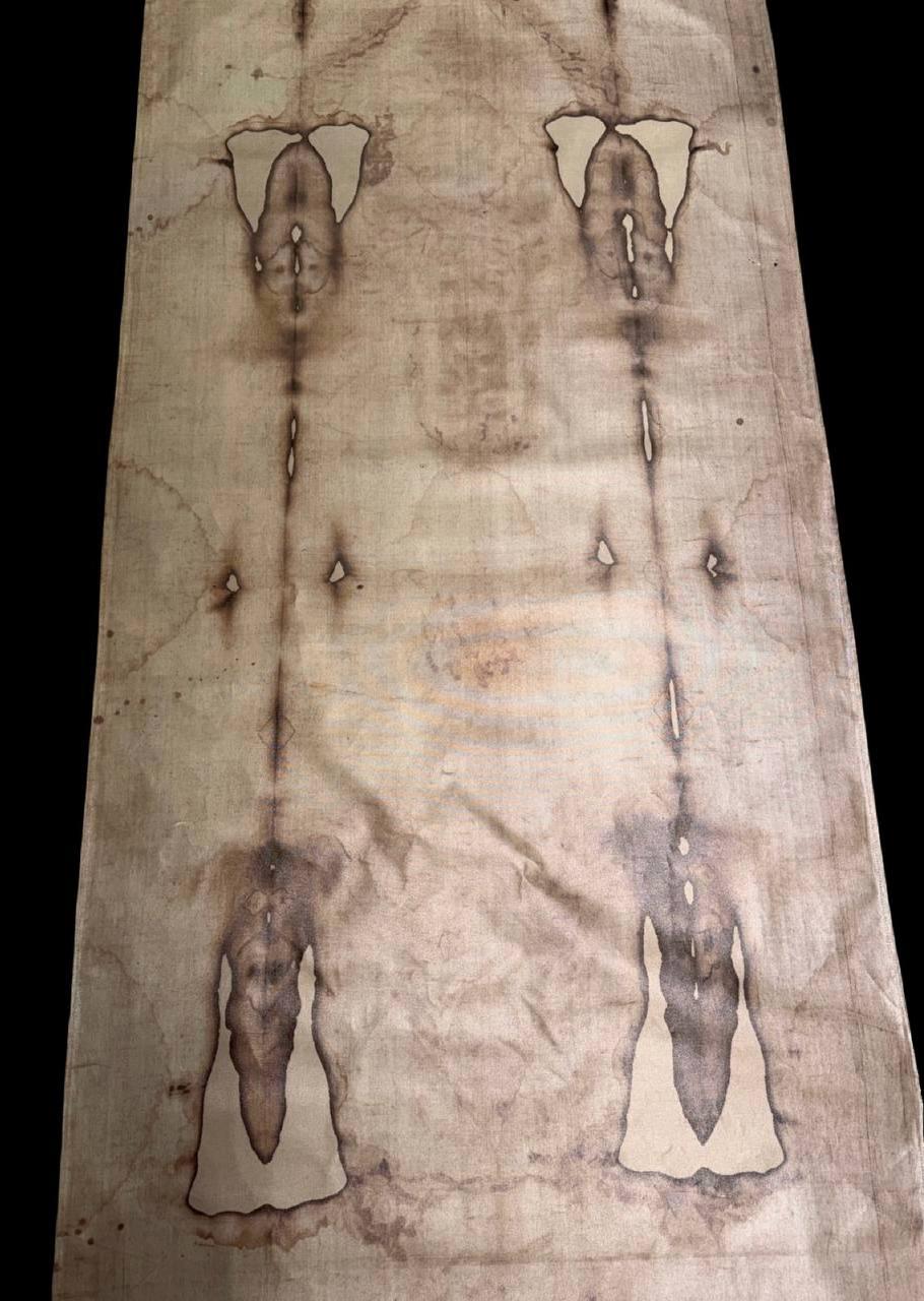 Detailed view of the linen surface, creases and visible marks on the Shroud reproduction